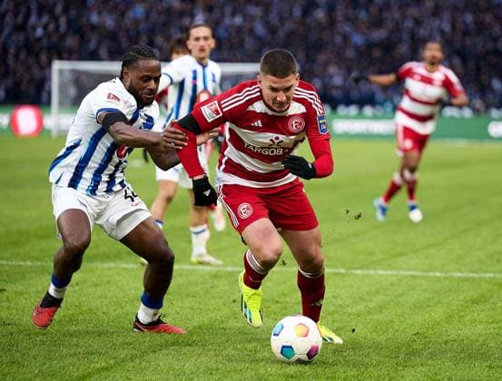 Deyovaisio Zeefuik Hertha BSC, 34 , Christos Tzolis Fortuna Duesseldorf, 07 , GER, Hertha BSC vs Fortuna Duesseldorf, Soccer Men, 2 Bundesliga, Season 2023 2024, Matchday 18, 21 01 2024 DFL REGULATES PROHIBIT ANY USE OF PHOTOGRAPHS AS IMAGE SEQUENCES AND OR QUASI VIDEO GER, Hertha BSC vs Fortuna Duesseldorf, Soccer men, 2 Bundesliga, Season 2023 2024, 18 Matchday, 21 01 2024 Berlin Copyright: xEibner-Pressefotox xClaudiusxRaux EP_CRH