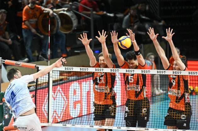 Berlin, Germany January 21, 2024 1 VBL 2023 2024 Berlin Recycling Volleys vs VfB Friedrichshafen In the picture from left Tim Peter VfB Friedrichshafen hits the ball into the Berlin block of Cody Kessel BR Volleys , Nehemiah Mote BR Volleys , Timothee Carle BR Volleys Copyright: xFotostandx xReuhlx