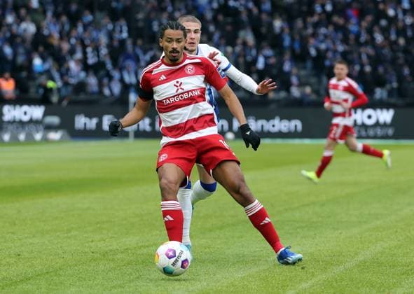 Emmanuel Iyoha, behind him Marten Winkler Single image Crop action Sport Football Soccer DFL 2 Bundesliga Men 18 Matchday Season 2023 2024 21 01 2024 Hertha BSC Berlin vs Fortuna Düsseldorf DFL regulations prohibit any use of photographs as image sequences and or quasi video