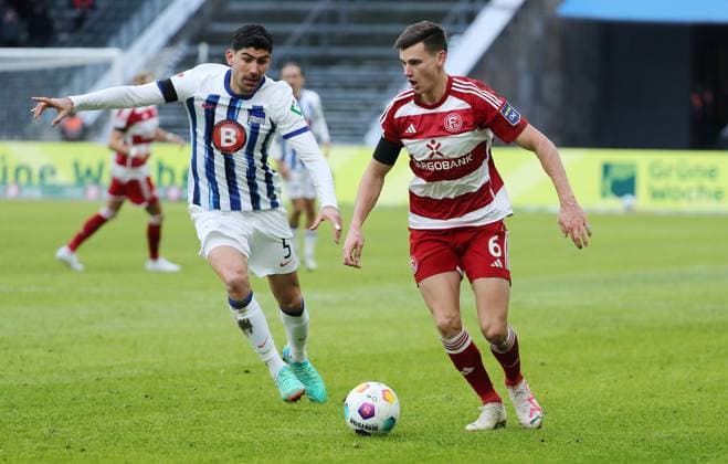 Andreas Bouchalakis, Yannik Engelhardt duel match scene action sport soccer soccer DFL 2 Bundesliga Men 18 Matchday Season 2023 2024 21 01 2024 Hertha BSC Berlin vs Fortuna Düsseldorf DFL regulations prohibit any use of photographs as image sequences and or quasi video