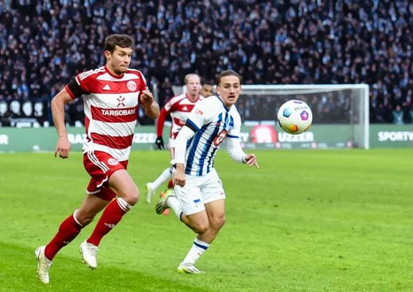 Soccer 2 Bundesliga, Hertha BSC Fortuna Duesseldorf 21 01 2024, xdanx, Soccer 2 Bundesliga, Hertha BSC Fortuna Duesseldorf, v l Yannick Engelhardt Fortuna Duesseldorf 6 ,Michal Karbownik Hertha BSC 6 , duel, duel, fight, tackle DFL DFB REGULATIONS PROHIBIT ANY USE OF PHOTOGRAPHS as IMAGE SEQUENCES and or QUASI VIDEO Photo Daniel Lakomski Mix1 Berlin Olympiastadion Berlin Berlin Germany EN Copyright: xDanielxLakomskix