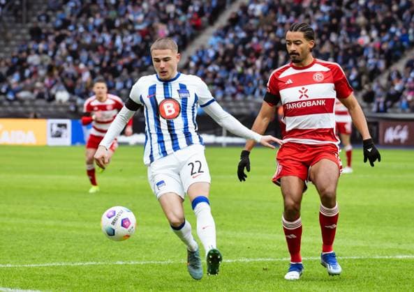 Soccer 2 Bundesliga, Hertha BSC Fortuna Duesseldorf 21 01 2024, xdanx, Soccer 2 Bundesliga, Hertha BSC Fortuna Duesseldorf, v l Marten Winkler Hertha BSC 22 ,Emmanuel Iyoha Fortuna Duesseldorf 19 ,duel, duel, fight, tackle DFL DFB REGULATIONS PROHIBIT ANY USE OF PHOTOGRAPHS as IMAGE SEQUENCES and or QUASI VIDEO Photo Daniel Lakomski Mix1 Berlin Olympiastadion Berlin Berlin Germany EN Copyright: xDanielxLakomskix