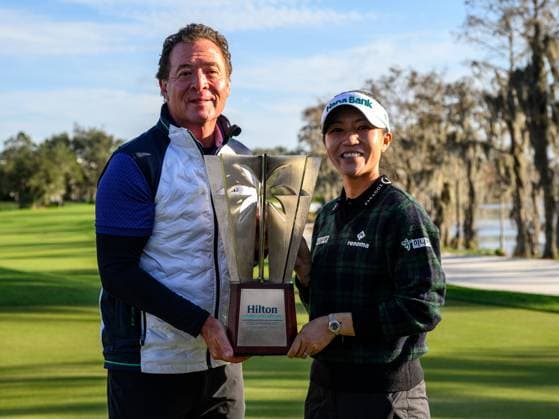 January 21, 2024: Lydia Ko of New Zealand poses with the winners trophy with Mark Wang President, Chief Executive Officer and a Director of Hilton Grand Vacations after the Hilton Grand Vacations Tournament of Champions held at Lake Nona Golf & Country Club in Orlando, FL. Romeo T Guzman CSM Orlando USA - ZUMAcg2_ 20240121_faf_cg2_106 Copyright: xRomeoxGuzmanx