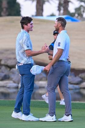 LA QUINTA, CA - JANUARY 21: Nick Dunlap (a) (USA) shakes hands with Sam Burns (USA) on the gree on 18 after winning The American Express tournament at PGA, Golf Herren West, Dye Stadium Course on January 21, 2024 in La Quinta, California. (Photo by Ken Murray Icon Sportswire) GOLF: JAN 21 PGA The American Express EDITORIAL USE ONLY Icon2401210124