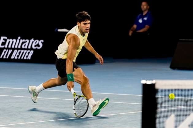 MELBOURNE, VIC - JANUARY 22: Carlos Alcaraz of Spain in action during the 4th round of the 2024 Australian Open on January 22 2024, at Melbourne Park in Melbourne, Australia. (Photo by Jason Heidrich Icon Sportswire) TENNIS: JAN 22 Australian Open EDITORIAL USE ONLY Icon240122202
