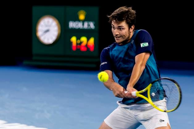 MELBOURNE, VIC - JANUARY 22: Miomir Kecmanovic of Serbia in action during the 4th round of the 2024 Australian Open on January 22 2024, at Melbourne Park in Melbourne, Australia. (Photo by Jason Heidrich Icon Sportswire) TENNIS: JAN 22 Australian Open EDITORIAL USE ONLY Icon240122222