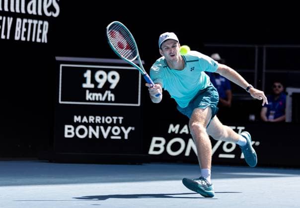 (240122) -- MELBOURNE, Jan. 22, 2024 -- Hubert Hurkacz of Poland competes during the men s singles 4th round match between Hubert Hurkacz of Poland and Arthur Cazaux of France at the Australian Open tennis tournament in Melbourne, Australia, Jan. 22, 2024. (Photo by Xinhua) (SP)AUSTRALIA-MELBOURNE-TENNIS-AUSTRALIAN OPEN HuxJingchen 