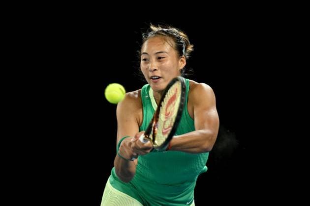 TENNIS AUSTRALIAN OPEN, Qinwen Zheng of China in action during her 4th round match against Oceane Dodin of France on Day 9 of the 2024 Australian Open at Melbourne Park in Melbourne, Monday, January 22, 2024. ( NO ARCHIVING, EDITORIAL USE ONLY, NO USE IN BOOKS WITHOUT CONSENT MELBOURNE VICTORIA AUSTRALIA  Copyright: xLUKASxCOCHx 20240122001892226448
