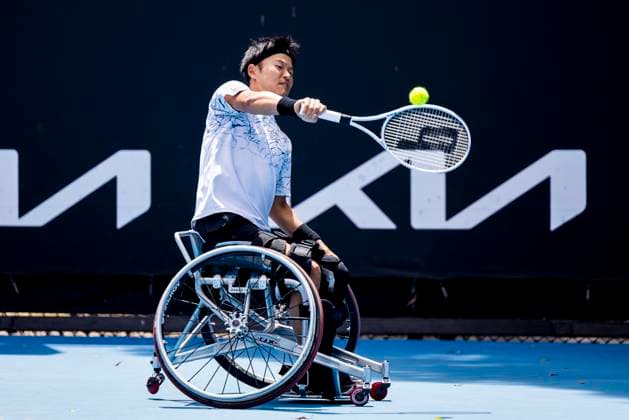 MELBOURNE, VIC - JANUARY 23: Takuya Miki of Japan in action during round 1 of the wheelchair event in the 2024 Australian Open on January 23 2024, at Melbourne Park in Melbourne, Australia. (Photo by Jason Heidrich Icon Sportswire) TENNIS: JAN 23 Australian Open EDITORIAL USE ONLY Icon240123088