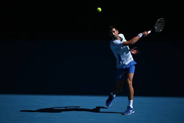 TENNIS AUSTRALIAN OPEN, Novak Djokovic of Serbia plays a return shot during his quarter final match against Taylor Fritz of the USA on Day 10 of the 2024 Australian Open at Melbourne Park in Melbourne, Tuesday, January 23, 2024. ( NO ARCHIVING, EDITORIAL USE ONLY, NO USE IN BOOKS WITHOUT CONSENT MELBOURNE VICTORIA AUSTRALIA  Copyright: xJAMESxROSSx 20240123001892524287