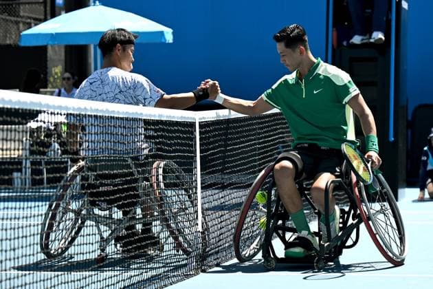 TENNIS AUSTRALIAN OPEN, Tokito Oda of Japan (right) shakes hands with Takuya Miki of Japan after winning the first round wheelchair singles match on Day 10 of the 2024 Australian Open at Melbourne Park in Melbourne, Tuesday, January 23, 2024. ( NO ARCHIVING, EDITORIAL USE ONLY, NO USE IN BOOKS WITHOUT CONSENT MELBOURNE VICTORIA AUSTRALIA  Copyright: xLUKASxCOCHx 20240123001892525619