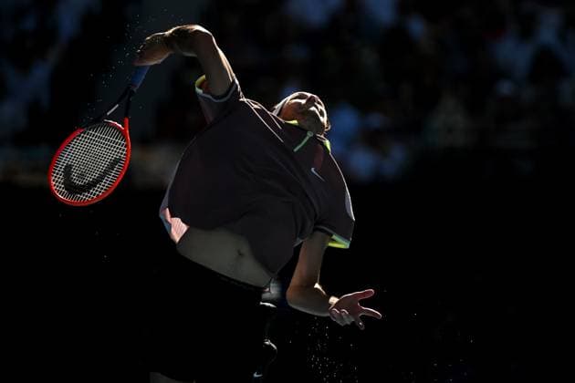 TENNIS AUSTRALIAN OPEN, Taylor Fritz of the USA serves during his quarter final match against Novak Djokovic of Serbia on Day 10 of the 2024 Australian Open at Melbourne Park in Melbourne, Tuesday, January 23, 2024. ( NO ARCHIVING, EDITORIAL USE ONLY, NO USE IN BOOKS WITHOUT CONSENT MELBOURNE VICTORIA AUSTRALIA  Copyright: xLUKASxCOCHx 20240123001892530973