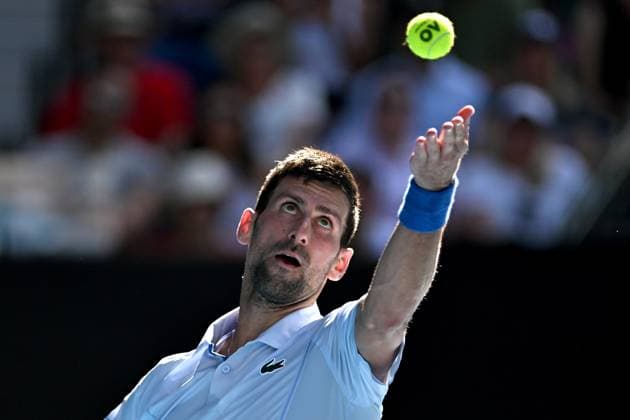 TENNIS AUSTRALIAN OPEN, Novak Djokovic of Serbia serves during his quarter final match against Taylor Fritz of the USA on Day 10 of the 2024 Australian Open at Melbourne Park in Melbourne, Tuesday, January 23, 2024. ( NO ARCHIVING, EDITORIAL USE ONLY, NO USE IN BOOKS WITHOUT CONSENT MELBOURNE VICTORIA AUSTRALIA  Copyright: xLUKASxCOCHx 20240123001892531368