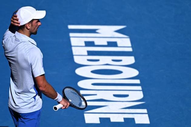 TENNIS AUSTRALIAN OPEN, Novak Djokovic of Serbia during his quarter final match against Taylor Fritz of the USA on Day 10 of the 2024 Australian Open at Melbourne Park in Melbourne, Tuesday, January 23, 2024. ( NO ARCHIVING, EDITORIAL USE ONLY, NO USE IN BOOKS WITHOUT CONSENT MELBOURNE VICTORIA AUSTRALIA  Copyright: xJOELxCARRETTx 20240123001892536888