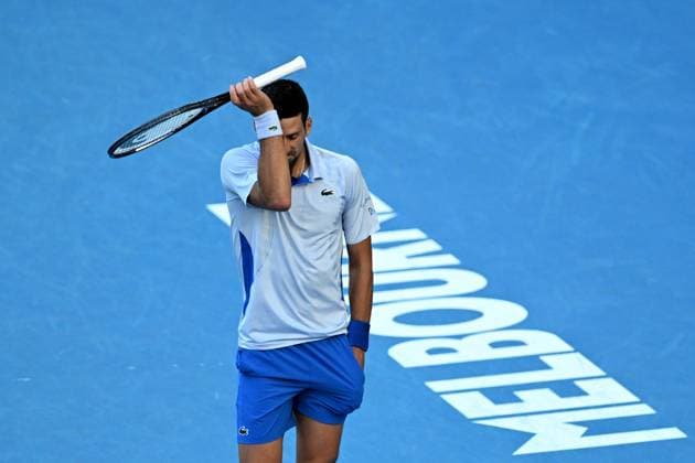 TENNIS AUSTRALIAN OPEN, Novak Djokovic of Serbia reacts during his quarter final match against Taylor Fritz of the USA on Day 10 of the 2024 Australian Open at Melbourne Park in Melbourne, Tuesday, January 23, 2024. ( NO ARCHIVING, EDITORIAL USE ONLY, NO USE IN BOOKS WITHOUT CONSENT MELBOURNE VICTORIA AUSTRALIA  Copyright: xLUKASxCOCHx 20240123001892556127