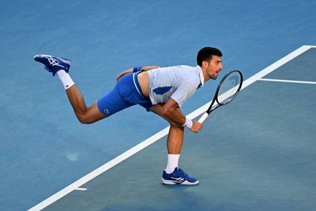 TENNIS AUSTRALIAN OPEN, Novak Djokovic of Serbia serves during his quarter final match against Taylor Fritz of the USA on Day 10 of the 2024 Australian Open at Melbourne Park in Melbourne, Tuesday, January 23, 2024. ( NO ARCHIVING, EDITORIAL USE ONLY, NO USE IN BOOKS WITHOUT CONSENT MELBOURNE VICTORIA AUSTRALIA  Copyright: xLUKASxCOCHx 20240123001892556317