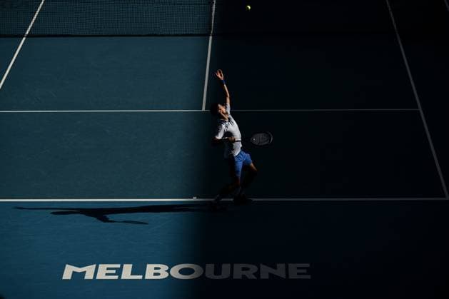 TENNIS AUSTRALIAN OPEN, Novak Djokovic of Serbia serves during his quarter final match against Taylor Fritz of the USA on Day 10 of the 2024 Australian Open at Melbourne Park in Melbourne, Tuesday, January 23, 2024. ( NO ARCHIVING, EDITORIAL USE ONLY, NO USE IN BOOKS WITHOUT CONSENT MELBOURNE VICTORIA AUSTRALIA  Copyright: xLUKASxCOCHx 20240123001892557089