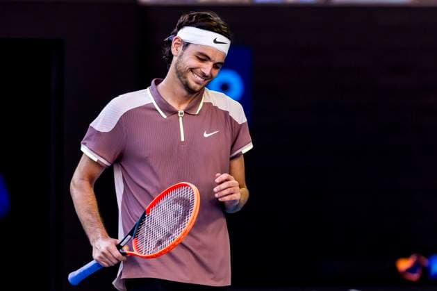 MELBOURNE, VIC - JANUARY 23: Taylor Fritz of the United States of America in action during the Quarterfinals of the 2024 Australian Open on January 23 2024, at Melbourne Park in Melbourne, Australia. (Photo by Jason Heidrich Icon Sportswire) TENNIS: JAN 23 Australian Open EDITORIAL USE ONLY Icon240123179