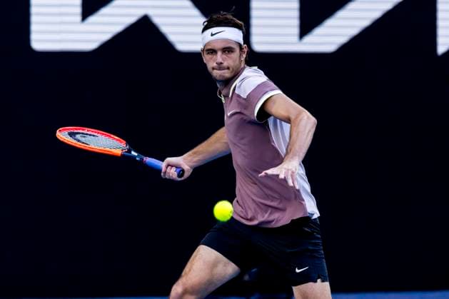 MELBOURNE, VIC - JANUARY 23: Taylor Fritz of the United States of America in action during the Quarterfinals of the 2024 Australian Open on January 23 2024, at Melbourne Park in Melbourne, Australia. (Photo by Jason Heidrich Icon Sportswire) TENNIS: JAN 23 Australian Open EDITORIAL USE ONLY Icon240123185
