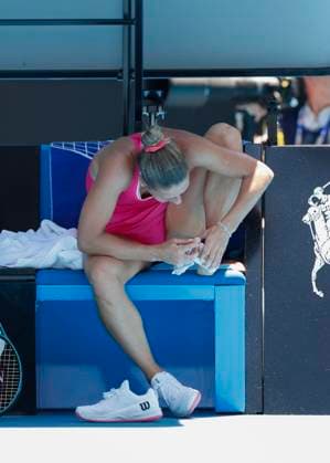 Marta Kostyuk sits on the bench, is injured, injury, Australian Open 2024, Melbourne Park, Melbourne, Victoria, Australia Copyright: xJuergenxHasenkopfx