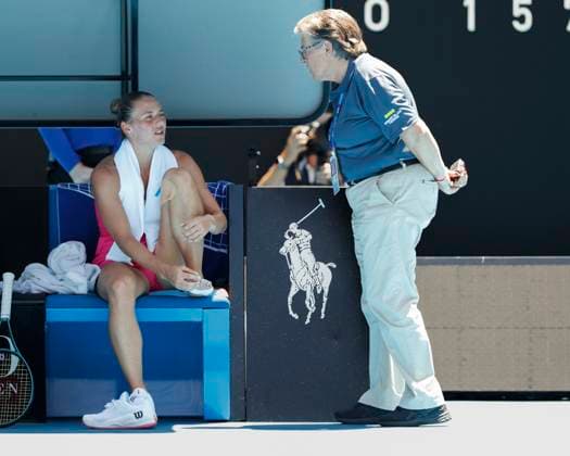 Marta Kostyuk sits on the bench and talks to supervisor Pam Whytcross,injured, injury, Australian Open 2024, Melbourne Park, Melbourne, Victoria, Australia Copyright: xJuergenxHasenkopfx
