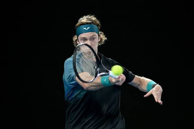 TENNIS AUSTRALIAN OPEN, Andrey Rublev of Russia plays a return shot during his quarter final match against Jannik Sinner of Italy on Day 10 of the 2024 Australian Open at Melbourne Park in Melbourne, Tuesday, January 23, 2024. ( NO ARCHIVING, EDITORIAL USE ONLY, NO USE IN BOOKS WITHOUT CONSENT MELBOURNE VICTORIA AUSTRALIA  Copyright: xLUKASxCOCHx 20240123001892594571