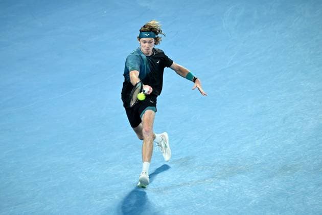 TENNIS AUSTRALIAN OPEN, Andrey Rublev of Russia plays a return shot during his quarter final match against Jannik Sinner of Italy on Day 10 of the 2024 Australian Open at Melbourne Park in Melbourne, Tuesday, January 23, 2024. ( NO ARCHIVING, EDITORIAL USE ONLY, NO USE IN BOOKS WITHOUT CONSENT MELBOURNE VICTORIA AUSTRALIA  Copyright: xJOELxCARRETTx 20240123001892600953