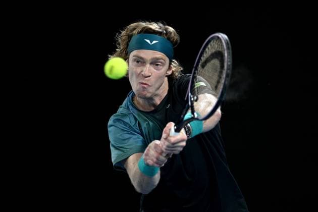 TENNIS AUSTRALIAN OPEN, Andrey Rublev of Russia plays a return shot during his quarter final match against Jannik Sinner of Italy on Day 10 of the 2024 Australian Open at Melbourne Park in Melbourne, Tuesday, January 23, 2024. ( NO ARCHIVING, EDITORIAL USE ONLY, NO USE IN BOOKS WITHOUT CONSENT MELBOURNE VICTORIA AUSTRALIA  Copyright: xLUKASxCOCHx 20240123001892603505