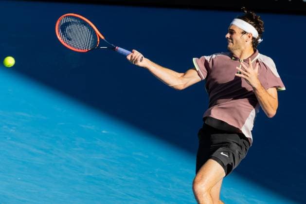 (240123) -- MELBOURNE, Jan. 23, 2024 -- Taylor Fritz competes during the men s singles quarterfinal match between Novak Djokovic of Serbia and Taylor Fritz of the United States at Australian Open tennis tournament in Melbourne, Australia, Jan. 23, 2024. (Photo by Xinhua) (SP)AUSTRALIA-MELBOURNE-TENNIS-AUSTRALIAN OPEN ChuxChen 