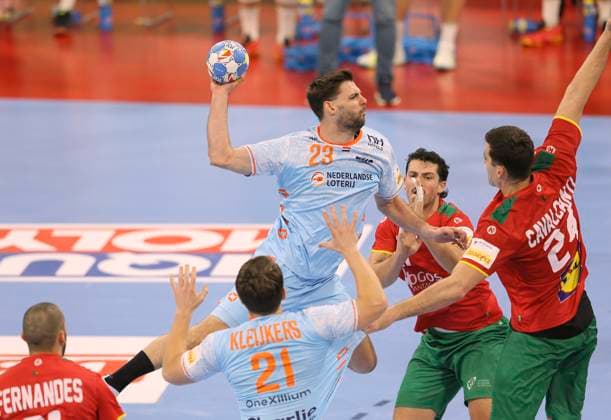 Photo Goal throw from Jorn SMITS NED against Alexandre de Oliveira Cavalcanti Portugal European Handball Championship, Main Round in Hamburg , on Tue 23 01 2024 Netherlands Portugal Claus Bergmann