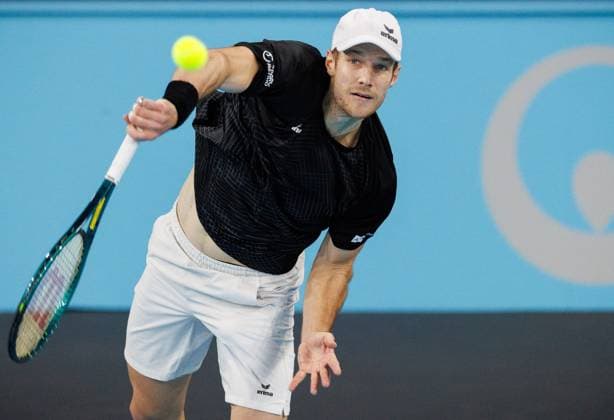 Belgian Joris De Loore pictured in action during a tennis match against Hungarian Piros, in the first round of the men s singles at the BW Open ATP, Tennis Herren Challenger 125 tournament, in Louvain-la-Neuve, Tuesday 23 January 2024. THE BW Open takes place from 22 to 28 January. BENOITxDOPPAGNE  x84515781x