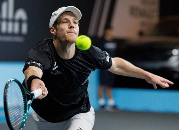 Belgian Joris De Loore pictured in action during a tennis match against Hungarian Piros, in the first round of the men s singles at the BW Open ATP, Tennis Herren Challenger 125 tournament, in Louvain-la-Neuve, Tuesday 23 January 2024. THE BW Open takes place from 22 to 28 January. BENOITxDOPPAGNE  x84515801x