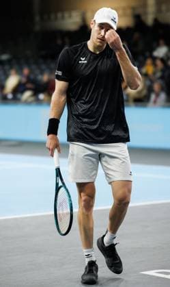 Belgian Joris De Loore looks dejected during a tennis match against Hungarian Piros, in the first round of the men s singles at the BW Open ATP, Tennis Herren Challenger 125 tournament, in Louvain-la-Neuve, Tuesday 23 January 2024. THE BW Open takes place from 22 to 28 January. BENOITxDOPPAGNE  x84515804x