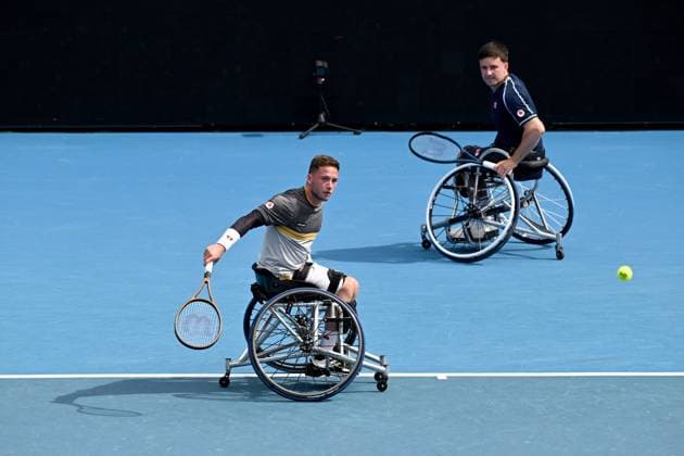 TENNIS AUSTRALIAN OPEN, Alfie Hewett and Gordon Reid of United Kingdom in action during their Men?s Wheelchair Doubles Quarterfinal against Ben Weekes and Anderson Parker of Australia on Day 11 of the 2024 Australian Open at Melbourne Park in Melbourne, Wednesday, January 24, 2024. ( NO ARCHIVING, EDITORIAL USE ONLY, NO USE IN BOOKS WITHOUT CONSENT MELBOURNE VICTORIA AUSTRALIA  Copyright: xJOELxCARRETTx 20240124001892906712