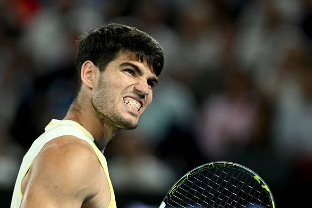 TENNIS AUSTRALIAN OPEN, Carlos Alcaraz of Spain reacts during his Mens Quarterfinal match against Alexander Zverev of Germany on Day 11 of the 2024 Australian Open at Melbourne Park in Melbourne, Wednesday, January 24, 2024. ( NO ARCHIVING, EDITORIAL USE ONLY, NO USE IN BOOKS WITHOUT CONSENT MELBOURNE VICTORIA AUSTRALIA  Copyright: xJOELxCARRETTx 20240124001892996569