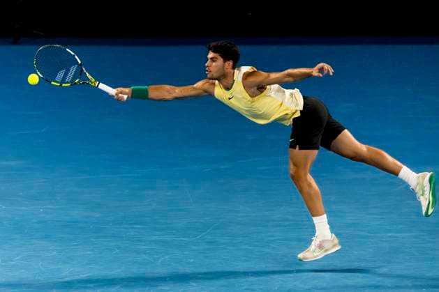MELBOURNE, VIC - JANUARY 24: Carlos Alcaraz of Spain in action during the Quarterfinals of the 2024 Australian Open on January 24 2024, at Melbourne Park in Melbourne, Australia. (Photo by Jason Heidrich Icon Sportswire) TENNIS: JAN 24 Australian Open EDITORIAL USE ONLY Icon240124255