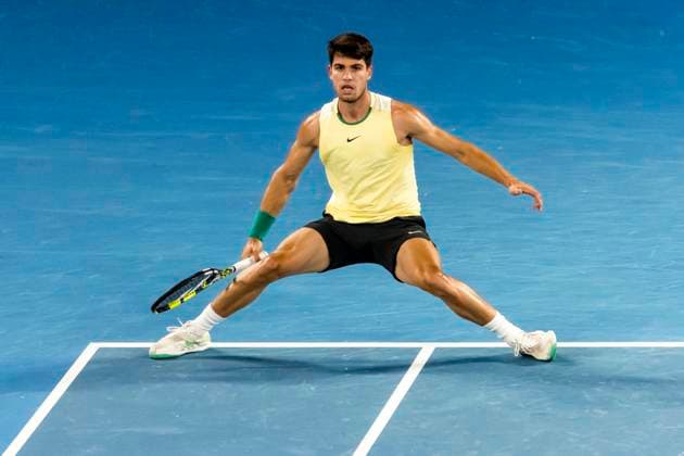 MELBOURNE, VIC - JANUARY 24: Carlos Alcaraz of Spain in action during the Quarterfinals of the 2024 Australian Open on January 24 2024, at Melbourne Park in Melbourne, Australia. (Photo by Jason Heidrich Icon Sportswire) TENNIS: JAN 24 Australian Open EDITORIAL USE ONLY Icon240124260
