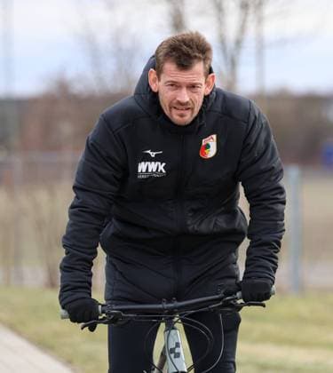Lars Knudsen Co Coach FC Augsburg , new Co Coach on his bike on the way to the training ground FC Augsburg, Training, FC Augsburg, Training, B-HAUPT