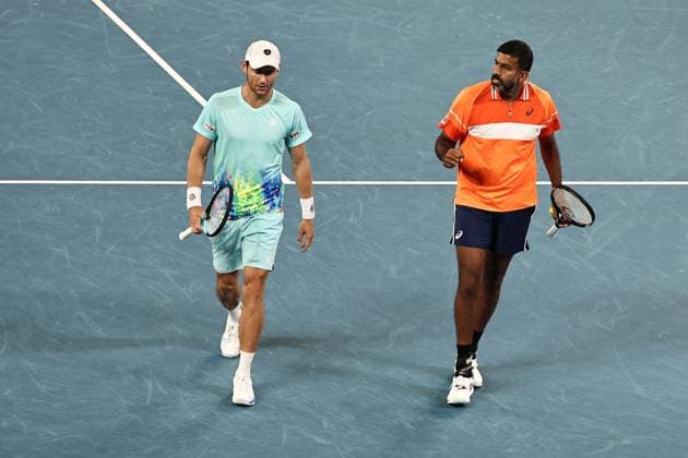 Rohan Bopanna orange , IND, and Matthew Ebden, AUS, during mens doubles of 2024 Australian Open in Melbourne, 25 01 2023