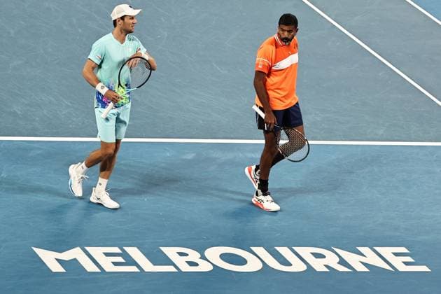 Rohan Bopanna orange , IND, and Matthew Ebden, AUS, during mens doubles of 2024 Australian Open in Melbourne, 25 01 2023
