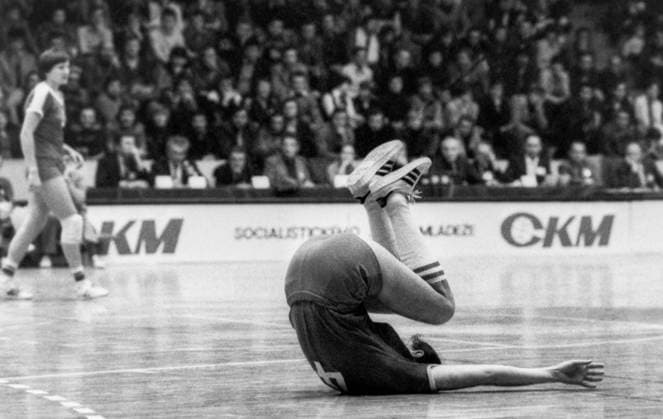 Bratislava, Czechoslovak Socialist Republic. Soviet handball player (ÃÂ¡) lies on the court during the match between the USSR and Yugoslavia at the 7th Women Handball World Championship, WM, Weltmeisterschaft  18727556