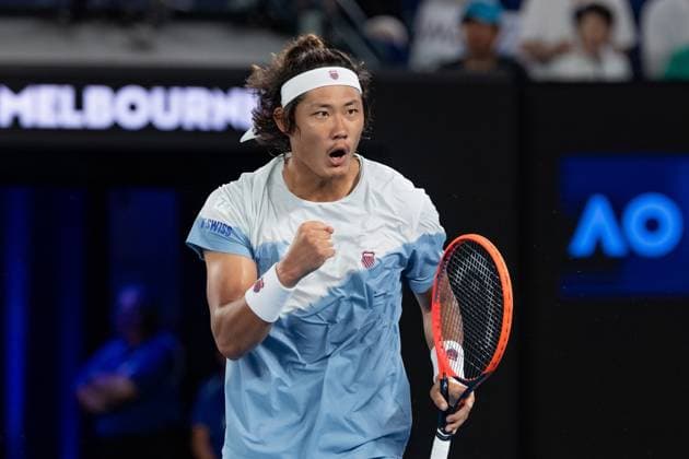 (240125) -- MELBOURNE, Jan. 25, 2024 -- Zhang Zhizhen celebrates during the men s doubles semifinal between Zhang Zhizhen (China) Tomas Machac (the Czech Republic) and Rohan Bopanna (India) Matthew Ebden (Australia) at Australian Open tennis tournament in Melbourne, Australia, Jan. 25, 2024. (Photo by Xinhua) (SP)AUSTRALIA-MELBOURNE-TENNIS-AUSTRALIAN OPEN-SEMIFINALS ChuxChen 