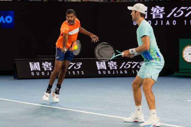 (240125) -- MELBOURNE, Jan. 25, 2024 -- Rohan Bopanna (L) Matthew Ebden compete during the men s doubles semifinal between Zhang Zhizhen (China) Tomas Machac (the Czech Republic) and Rohan Bopanna (India) Matthew Ebden (Australia) at Australian Open tennis tournament in Melbourne, Australia, Jan. 25, 2024. (Photo by Xinhua) (SP)AUSTRALIA-MELBOURNE-TENNIS-AUSTRALIAN OPEN-SEMIFINALS ChuxChen 