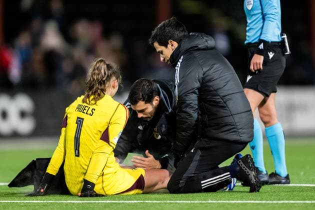 240125 Goalkeeper Lena Pauels of Benfica receives medical attention during the UEFA Women s Champions League football match between FC Rosengard and Benfica on January 25, 2024 in Malmö Photo Petter Arvidson BILDBYRAN kod PA PA0740 fotboll football soccer fotball champions league fc rosengard benfica dam bbeng  Copyright: PETTERxARVIDSON BB240125PA172