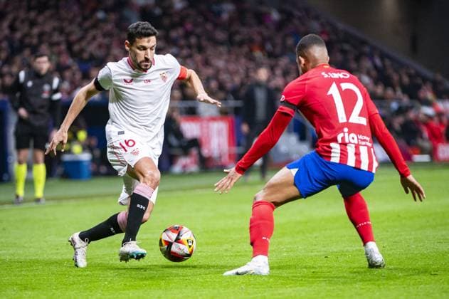 Spanish Cup soccer match - Atletico Madrid vs Sevilla Jesus Navas of Sevilla seen in action with the ball against Samuel Lino of Atletico Madrid during the football match valid for quarter finals of the Copa del Rey tournament between Atletico Madrid and Sevilla played at Estadio Metropolitano in Madrid, Spain. Madrid Spain  Copyright: xIPAxSport ABACAx