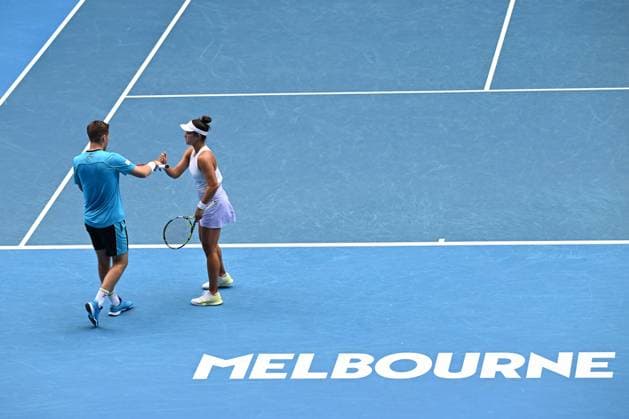TENNIS AUSTRALIAN OPEN, Desirae Krawczyk (right) of the USA and Neal Skupski (left) of United Kingdom in action during their Mixed Doubles final against Su-Wei Hsieh of Chinese Taipei and Jan Zielinski of Poland on Rod Laver Arena on Day 13 of the 2024 Australian Open at Melbourne Park in Melbourne, Friday, January 26, 2024. ( NO ARCHIVING, EDITORIAL USE ONLY, NO USE IN BOOKS WITHOUT CONSENT MELBOURNE VICTORIA AUSTRALIA  Copyright: xJOELxCARRETTx 20240126001893720740