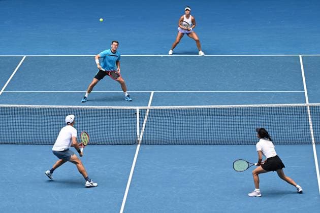 TENNIS AUSTRALIAN OPEN, Desirae Krawczyk (top right) of the USA and Neal Skupski (top left) of United Kingdom in action during their Mixed Doubles final against Su-Wei Hsieh (bottom right) of Chinese Taipei and Jan Zielinski (bottom left) of Poland on Rod Laver Arena on Day 13 of the 2024 Australian Open at Melbourne Park in Melbourne, Friday, January 26, 2024. ( NO ARCHIVING, EDITORIAL USE ONLY, NO USE IN BOOKS WITHOUT CONSENT MELBOURNE VICTORIA AUSTRALIA  Copyright: xJOELxCARRETTx 20240126001893721991