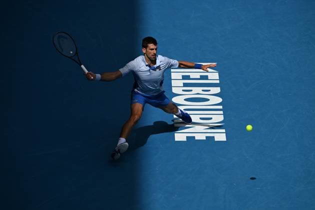 TENNIS AUSTRALIAN OPEN, Novak Djokovic of Serbia in action during his Men?s semifinal against Jannik Sinner of Italy on Day 13 of the 2024 Australian Open at Melbourne Park in Melbourne, Friday, January 26, 2024. ( NO ARCHIVING, EDITORIAL USE ONLY, NO USE IN BOOKS WITHOUT CONSENT MELBOURNE VICTORIA AUSTRALIA  Copyright: xJAMESxROSSx 20240126001893768931