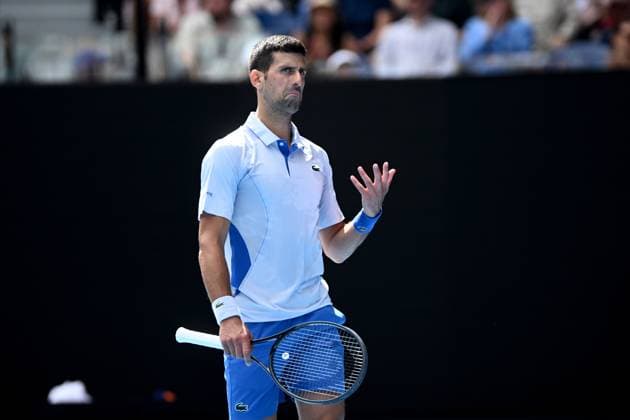 TENNIS AUSTRALIAN OPEN, Novak Djokovic of Serbia reacts during his Men?s semifinal against Jannik Sinner of Italy on Day 13 of the 2024 Australian Open at Melbourne Park in Melbourne, , Friday, January 26, 2024. ( NO ARCHIVING, EDITORIAL USE ONLY, NO USE IN BOOKS WITHOUT CONSENT MELBOURNE VICTORIA AUSTRALIA  Copyright: xJOELxCARRETTx 20240126001893770953