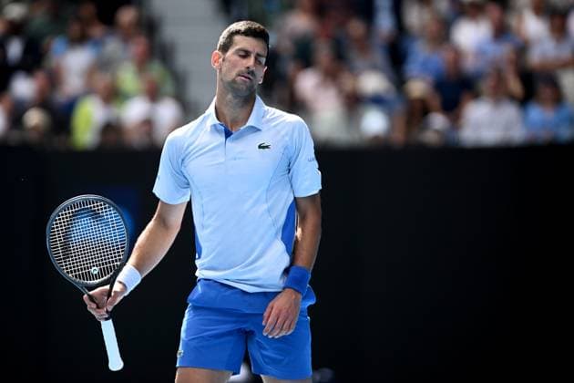 TENNIS AUSTRALIAN OPEN, Novak Djokovic of Serbia reacts during his Men?s semifinal against Jannik Sinner of Italy on Day 13 of the 2024 Australian Open at Melbourne Park in Melbourne, , Friday, January 26, 2024. ( NO ARCHIVING, EDITORIAL USE ONLY, NO USE IN BOOKS WITHOUT CONSENT MELBOURNE VICTORIA AUSTRALIA  Copyright: xJOELxCARRETTx 20240126001893771060